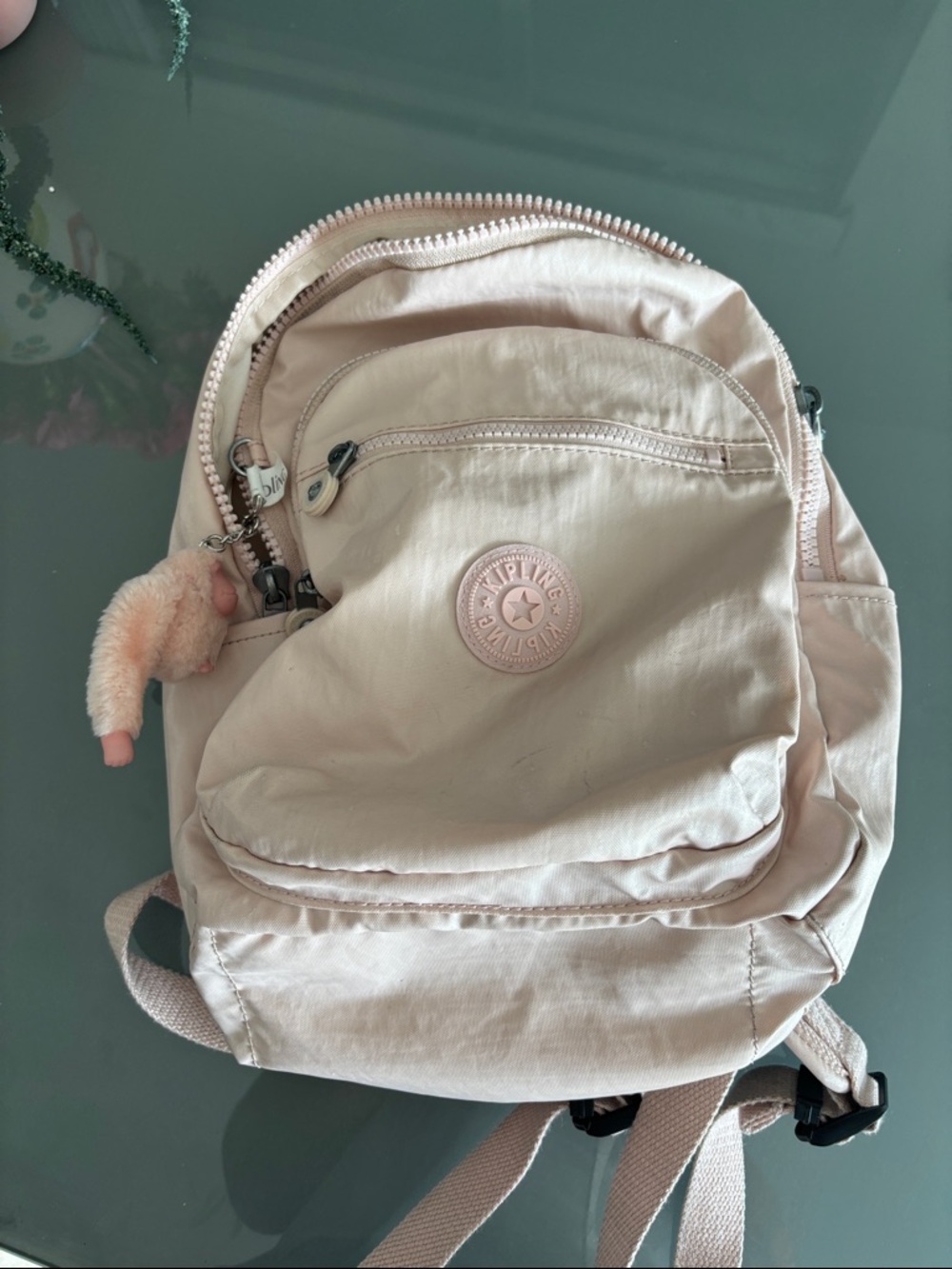 Kipling Pale Pink Mini Backpack with Signature Logo and Pom Key Charm